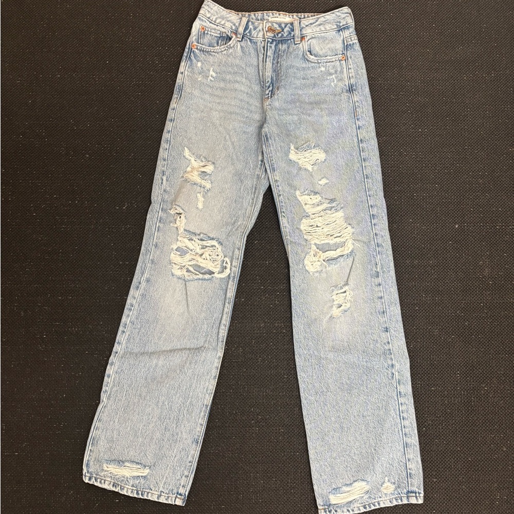 Distressed Mid-Rise Light Blue Jeans